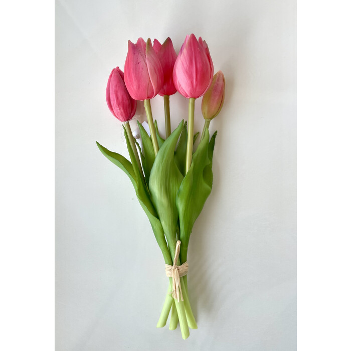 A bouquet of bright pink latex tulips