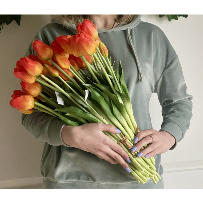 A bouquet of orange latex tulips