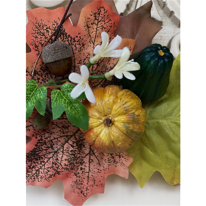 Autumn wreath with pumpkins