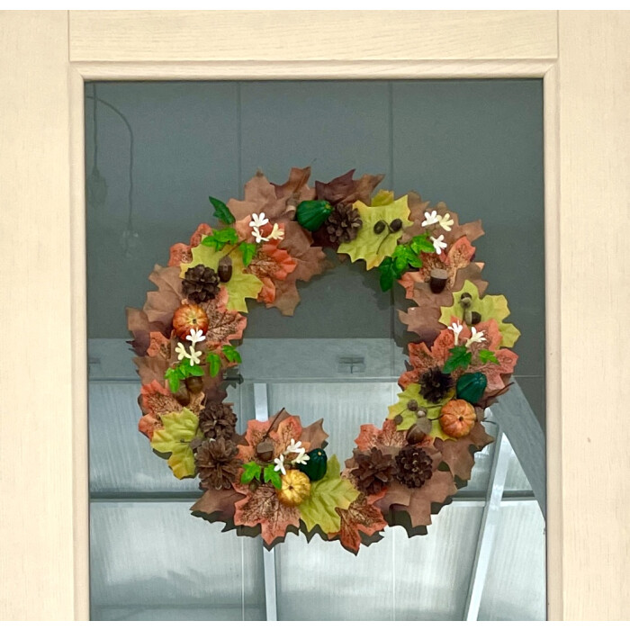 Autumn wreath with pumpkins