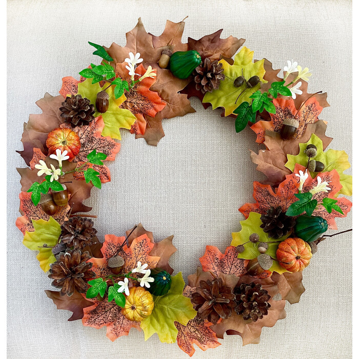 Autumn wreath with pumpkins